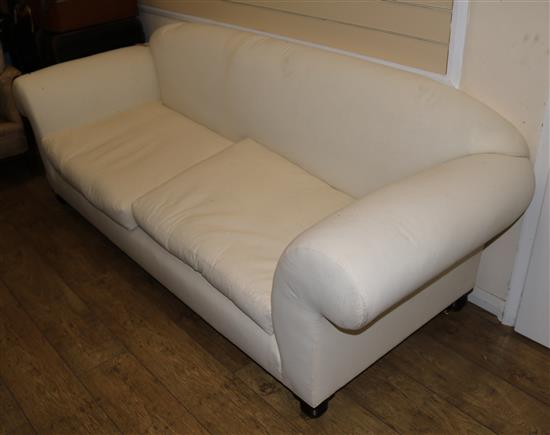 A Victorian Chesterfield settee, upholstered in calico W.214cm